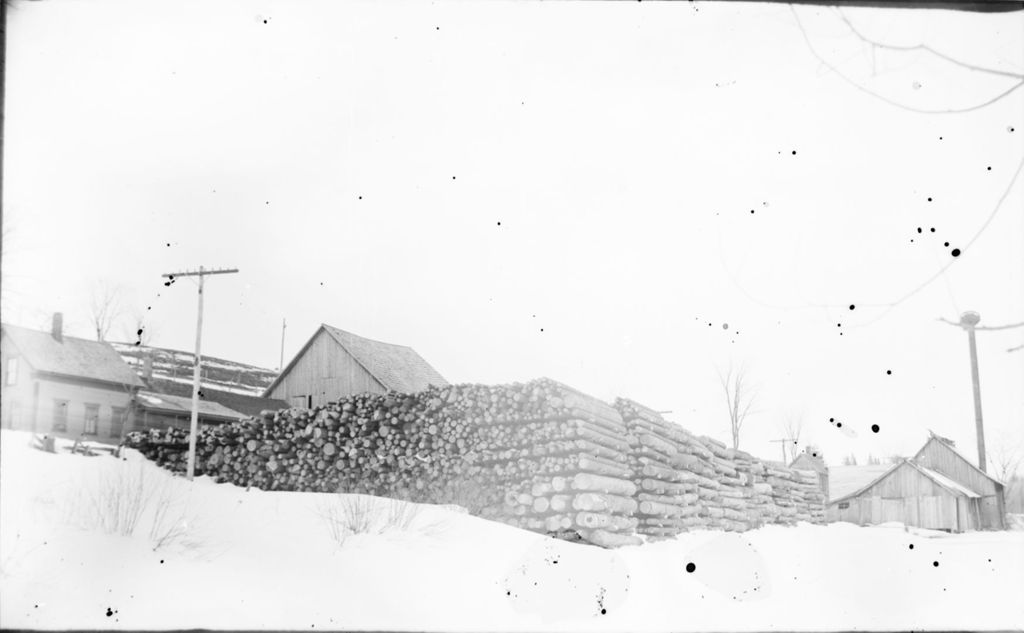 Miniature of Several large log piles