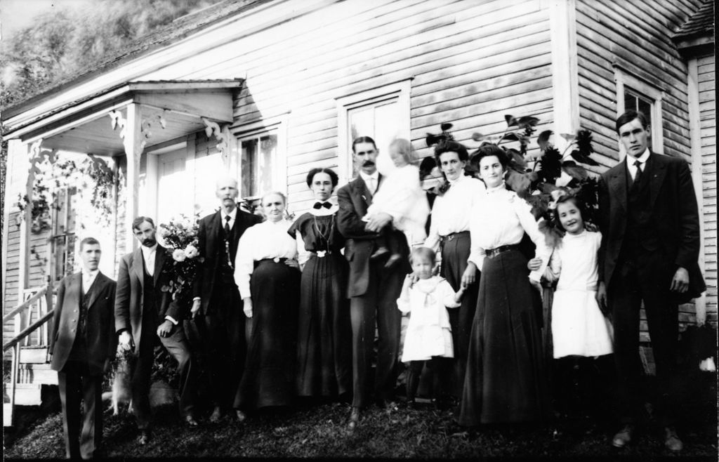 Miniature of Family portrait, standing in front of house