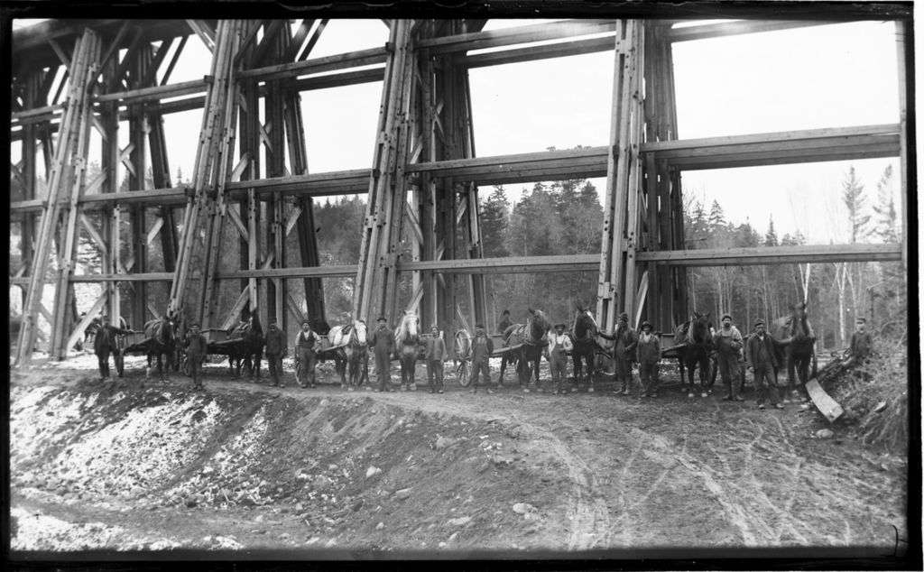 Miniature of Men with horses and wagons at the bottom of the Pumpkin Hill Bridge in Danville, Vermont