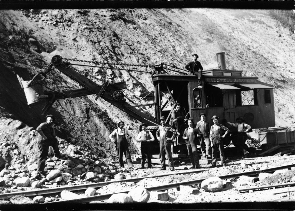 Miniature of Railroad workers pictured with a steam powered shovel