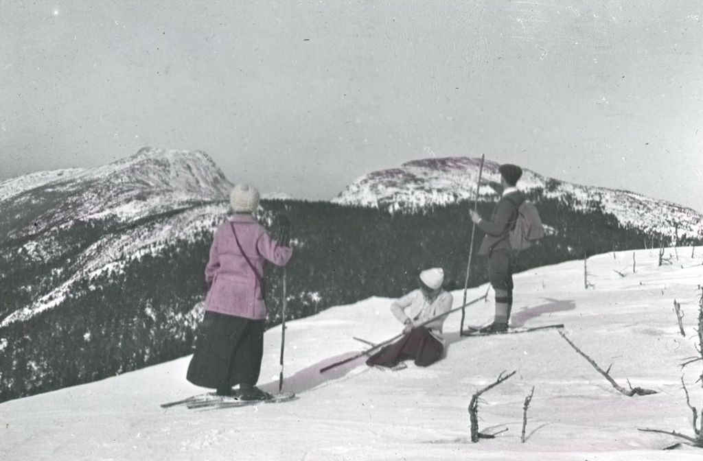 Miniature of Snowshoers looking at a mountain gap