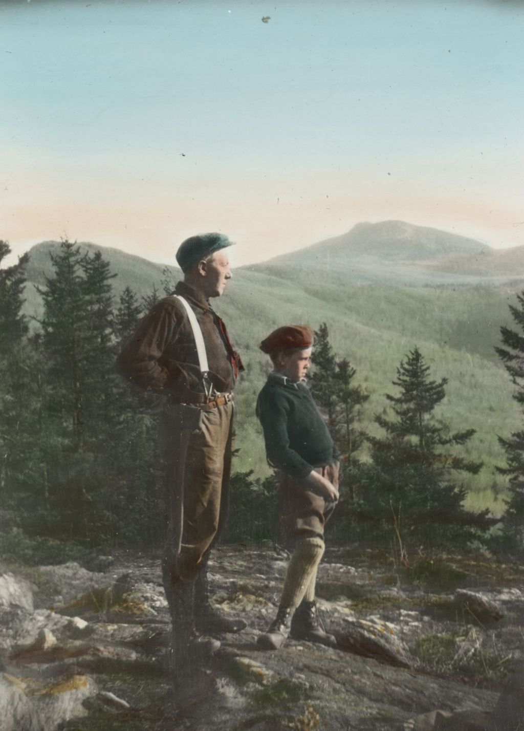 Miniature of Man and boy on a rock clearing