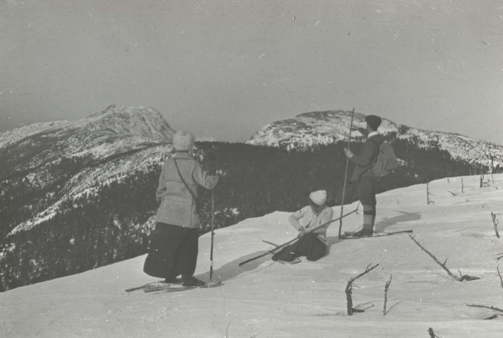 Miniature of Snowshoers looking at a mountain gap