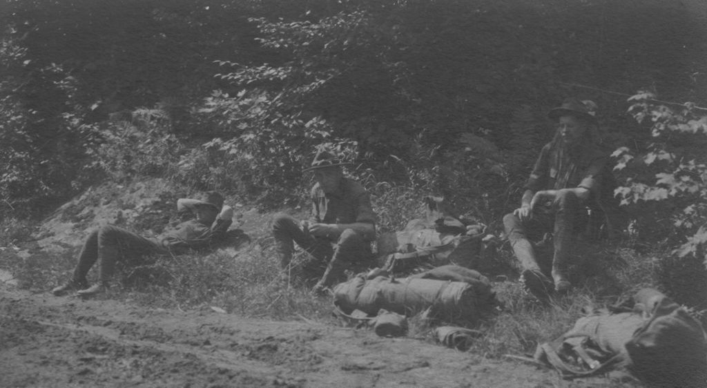 Miniature of Three men sitting near the trail