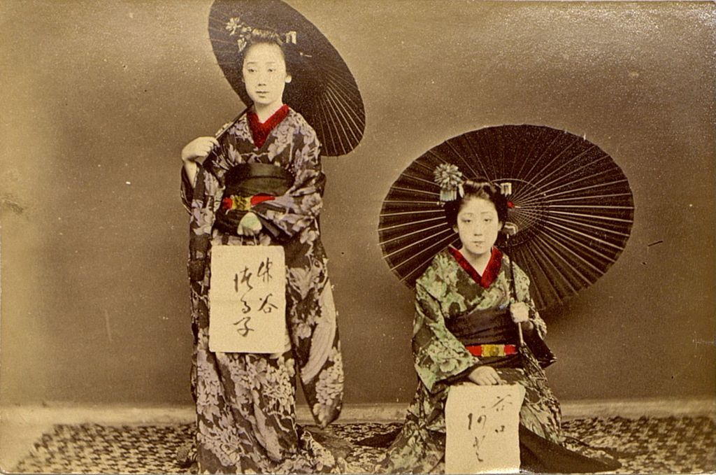 Miniature of Two women posing for a picture with their calligraphy