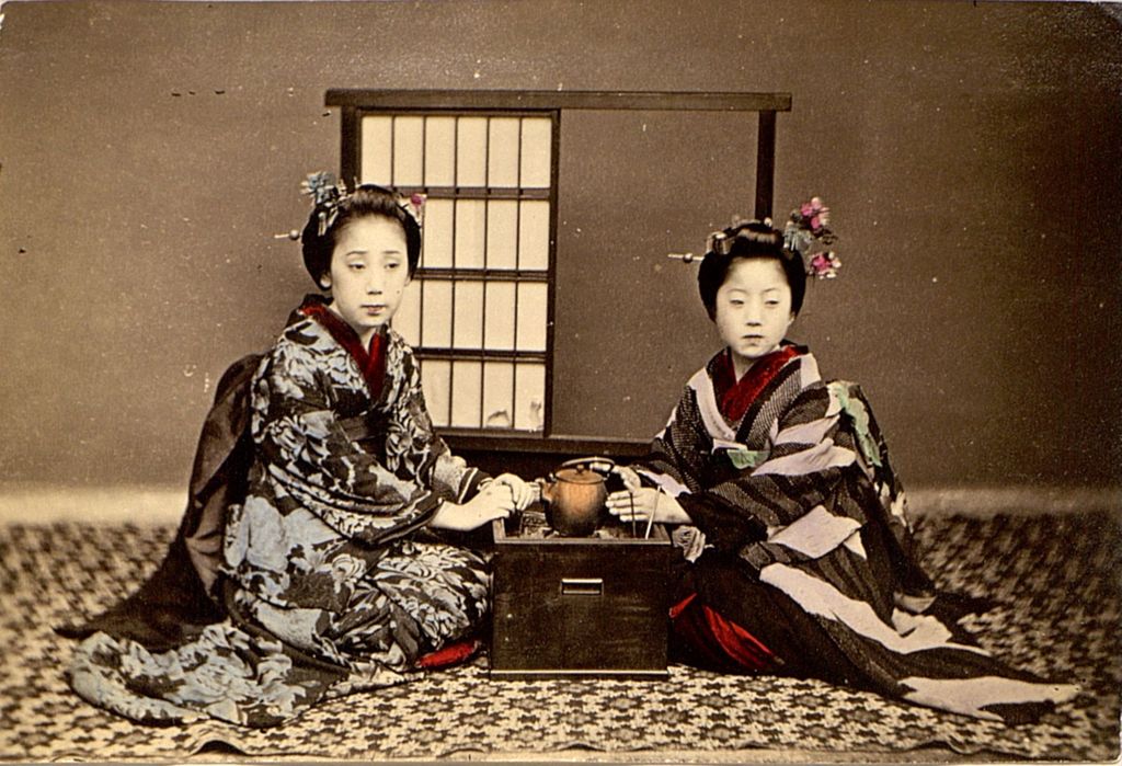 Miniature of Two women posing with a tea set