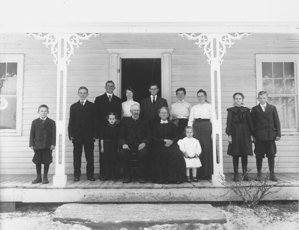 Miniature of Fred Holland's family on their porch in East Dover