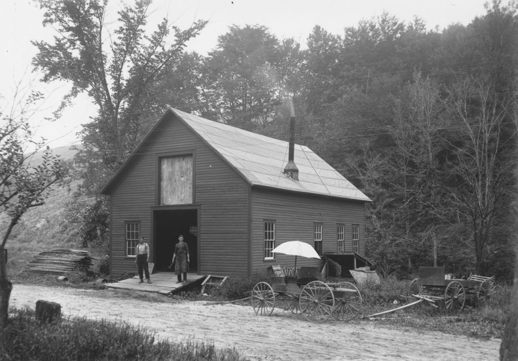 Miniature of Exterior of a blcaksmith's shop with two employees, Jacksonville, Vt.