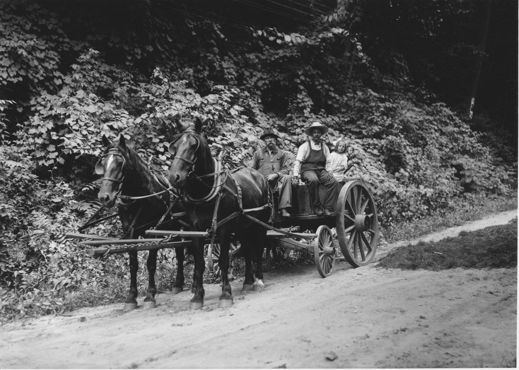 Miniature of Horse and wagon with two men and a girl