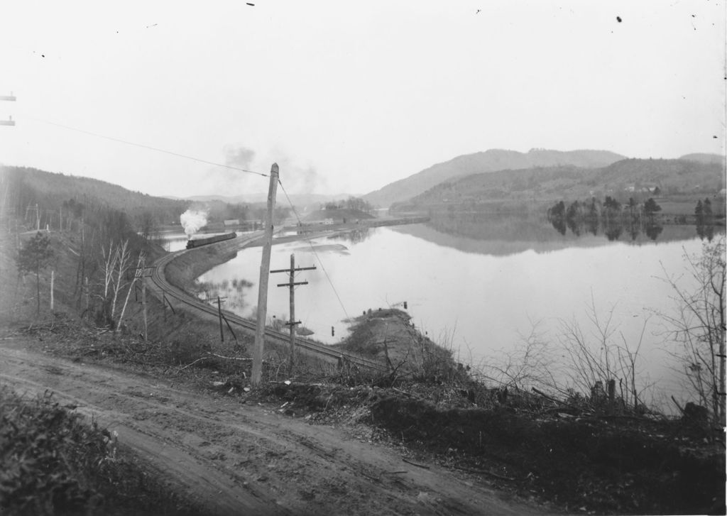 Miniature of Train running next to river in Vermont