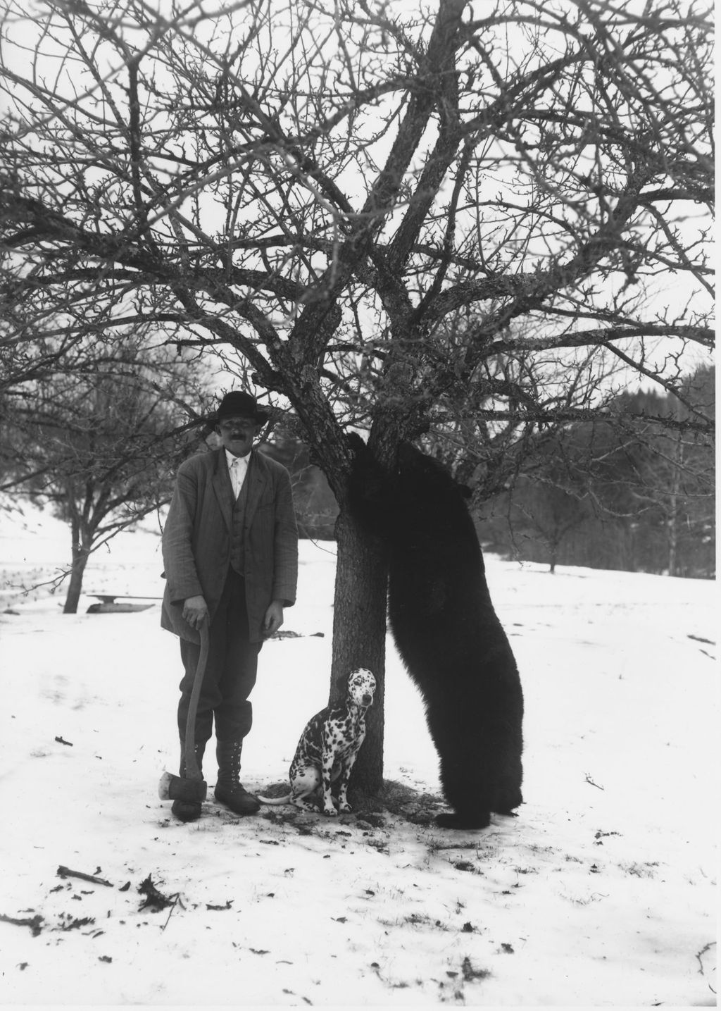 Miniature of James Mundell standing next to a bear that he killed and a dog, Dover, Vt.