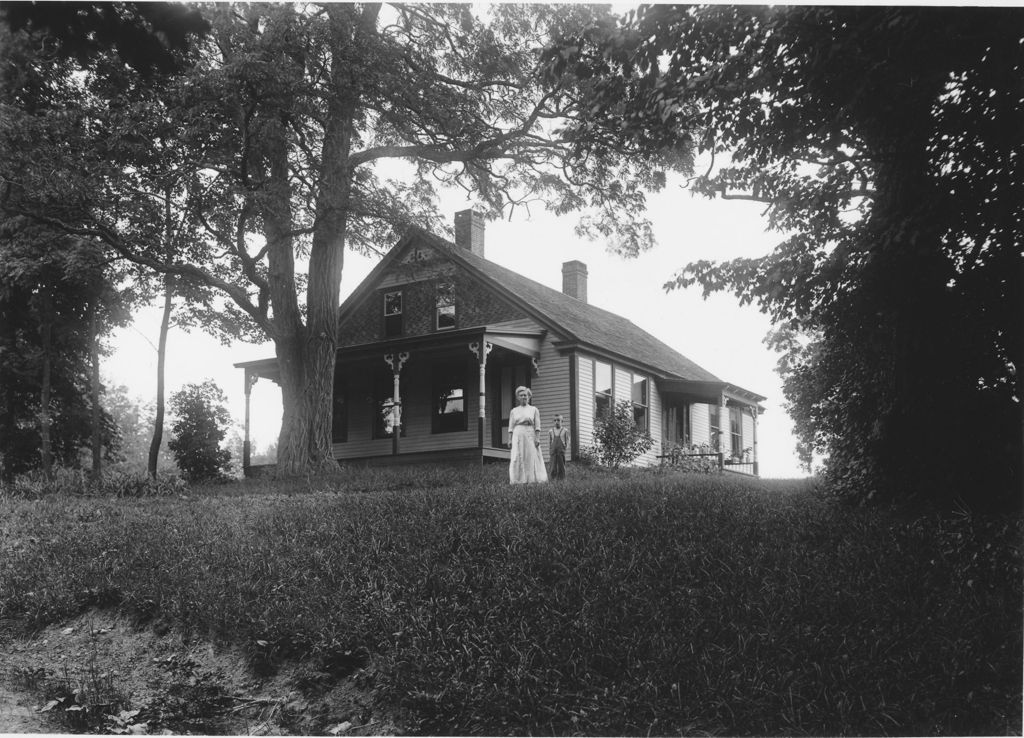 Miniature of Unidentified house with woman and child in front