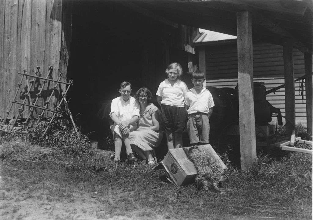 Miniature of Family portrait in front of a barn with a porcupine skin