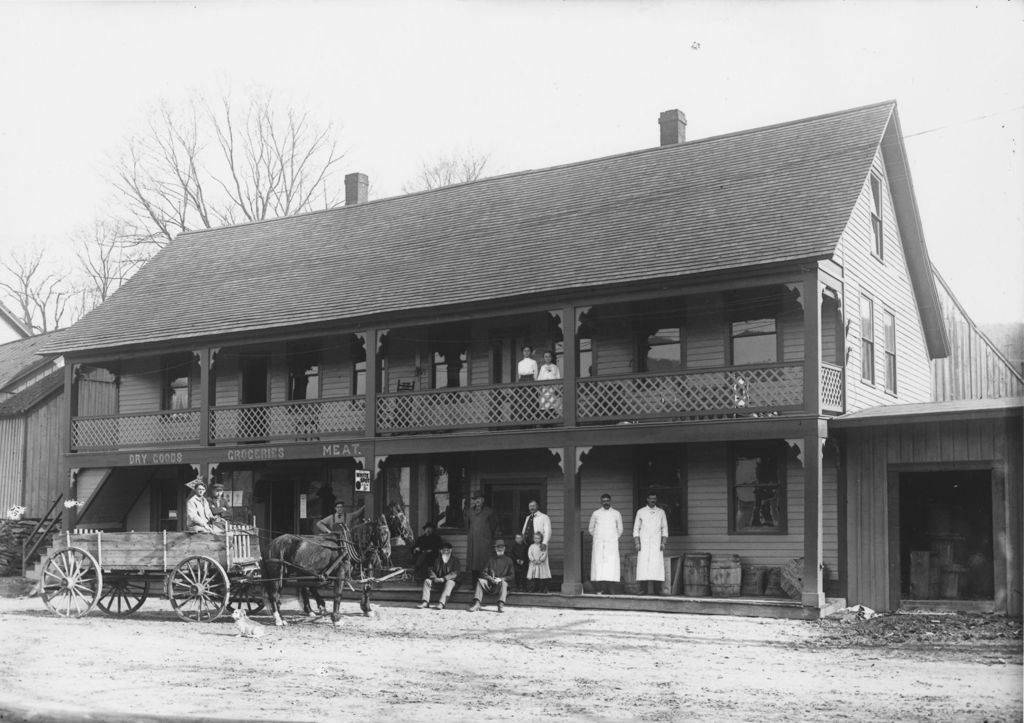 Miniature of Pulled back image of a dry goods and grocery store with people on the porch