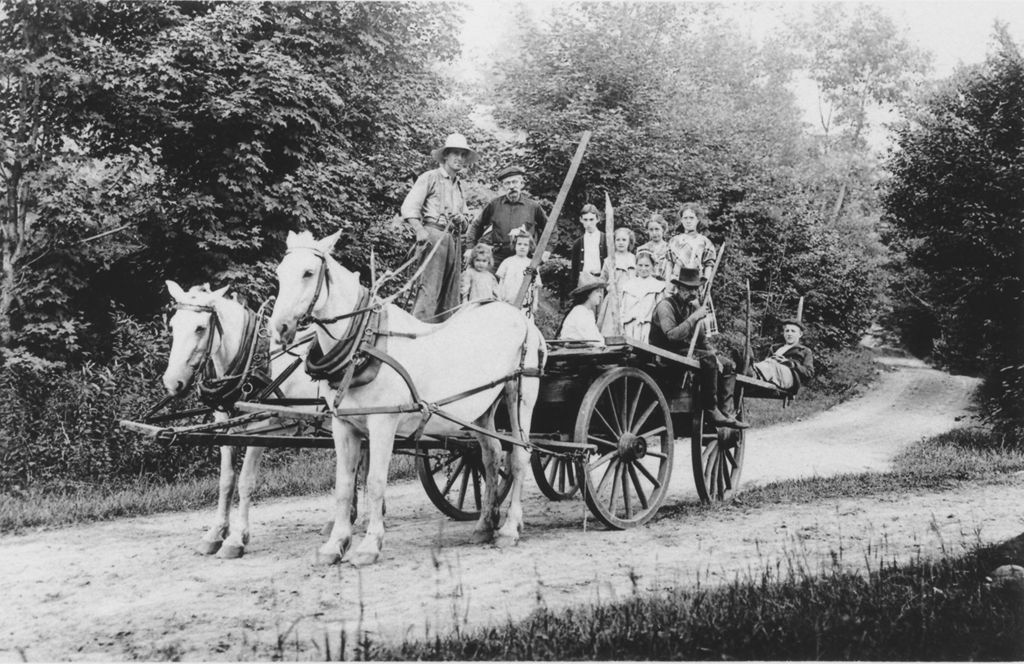 Miniature of Claude Reed and his horse team, with a cart full of people, in Vermont