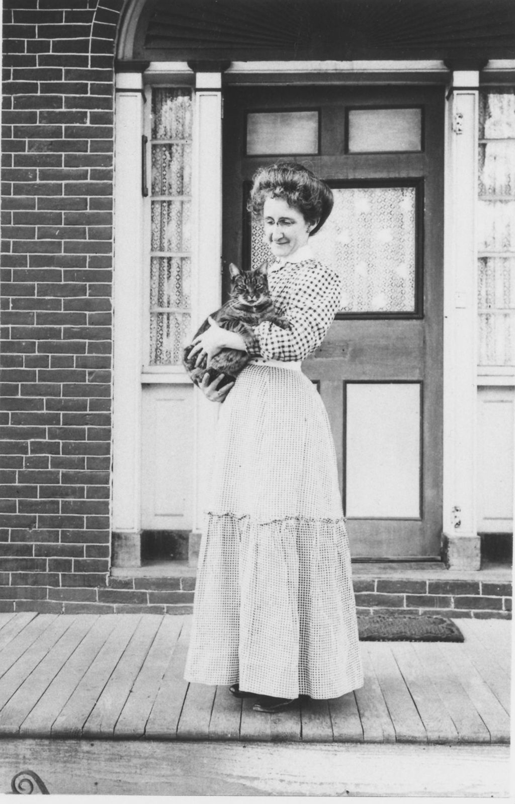 Miniature of Lady holding an 11 pound cat in Vermont